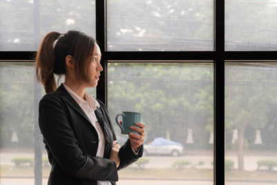 Young woman using mobile phone