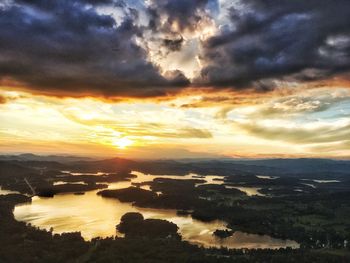Scenic view of landscape against sky during sunset