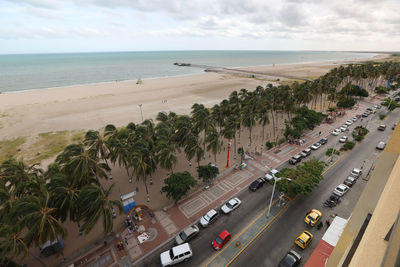 High angle view of road by sea against sky