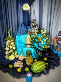 Close-up of blue flowers on table at home