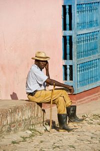 Man sitting in hat