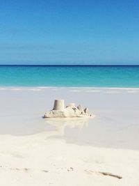 Sand castle on shore