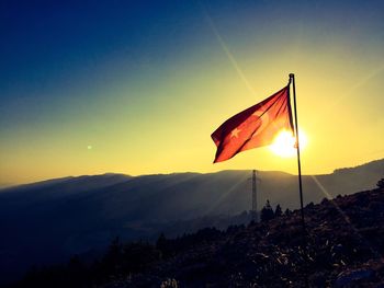 Scenic view of mountains against sky during sunset