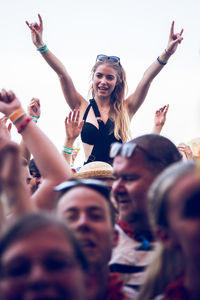 Group of people enjoying at music concert