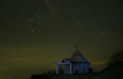 House against sky at night