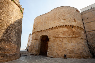 Low angle view of fort against the sky