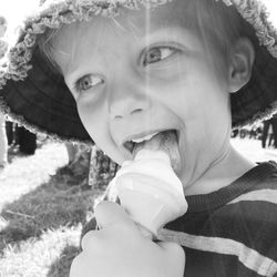 Close-up of cute boy eating ice cream