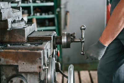 Low section of man working in workshop