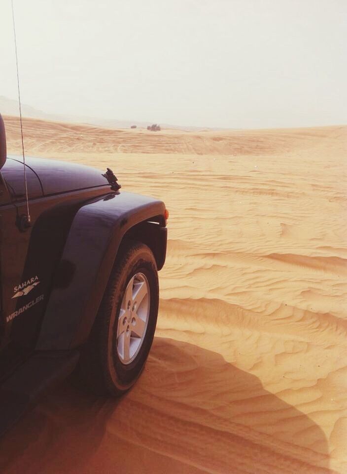 transportation, mode of transport, land vehicle, car, clear sky, travel, desert, copy space, sunset, landscape, sky, sand, part of, nature, cropped, on the move, outdoors, scenics, tranquil scene, air vehicle