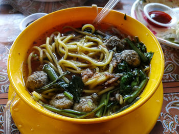 Close-up of noodles in bowl on table