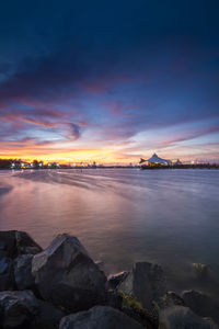 Scenic view of sea against sky during sunset