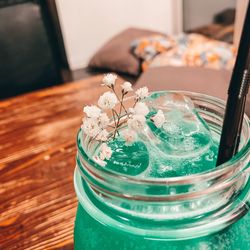 High angle view of glass vase on table