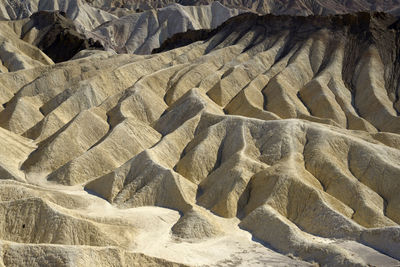 Full frame shot of rocks on sand