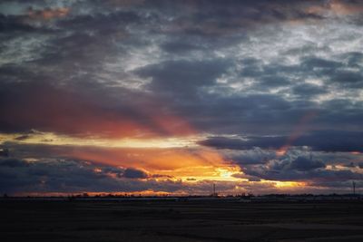 Scenic view of dramatic sky during sunset