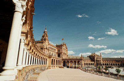 View of historic building against cloudy sky