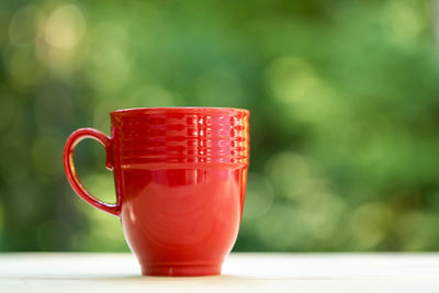 Close-up of coffee cup on table