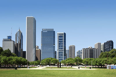 View of modern buildings against clear sky