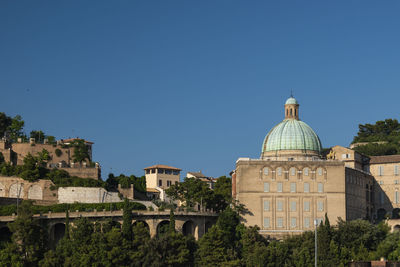 Buildings against blue sky