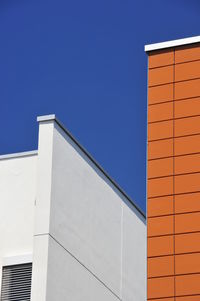 Low angle view of buildings against clear sky