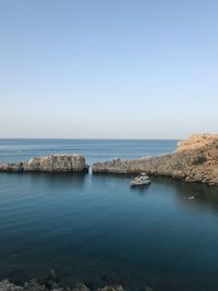 Scenic view of sea against clear sky