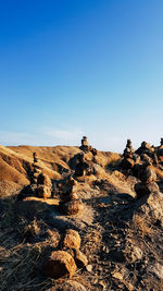 Scenic view of landscape against clear blue sky
