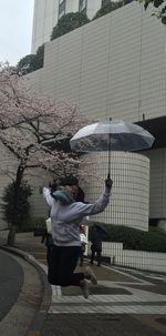 Woman walking on road