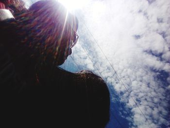 Portrait of young man against sky