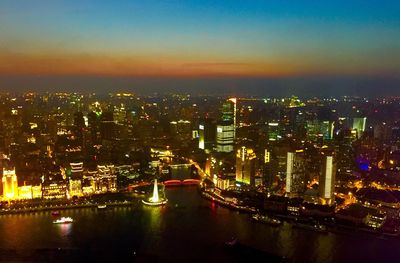 Aerial view of city at dusk