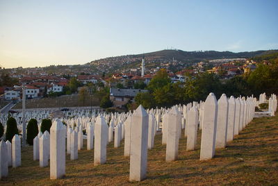 Panoramic shot of buildings against clear sky