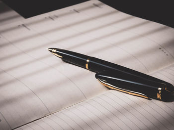 High angle view of pen on table