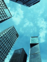 Low angle view of modern buildings against sky