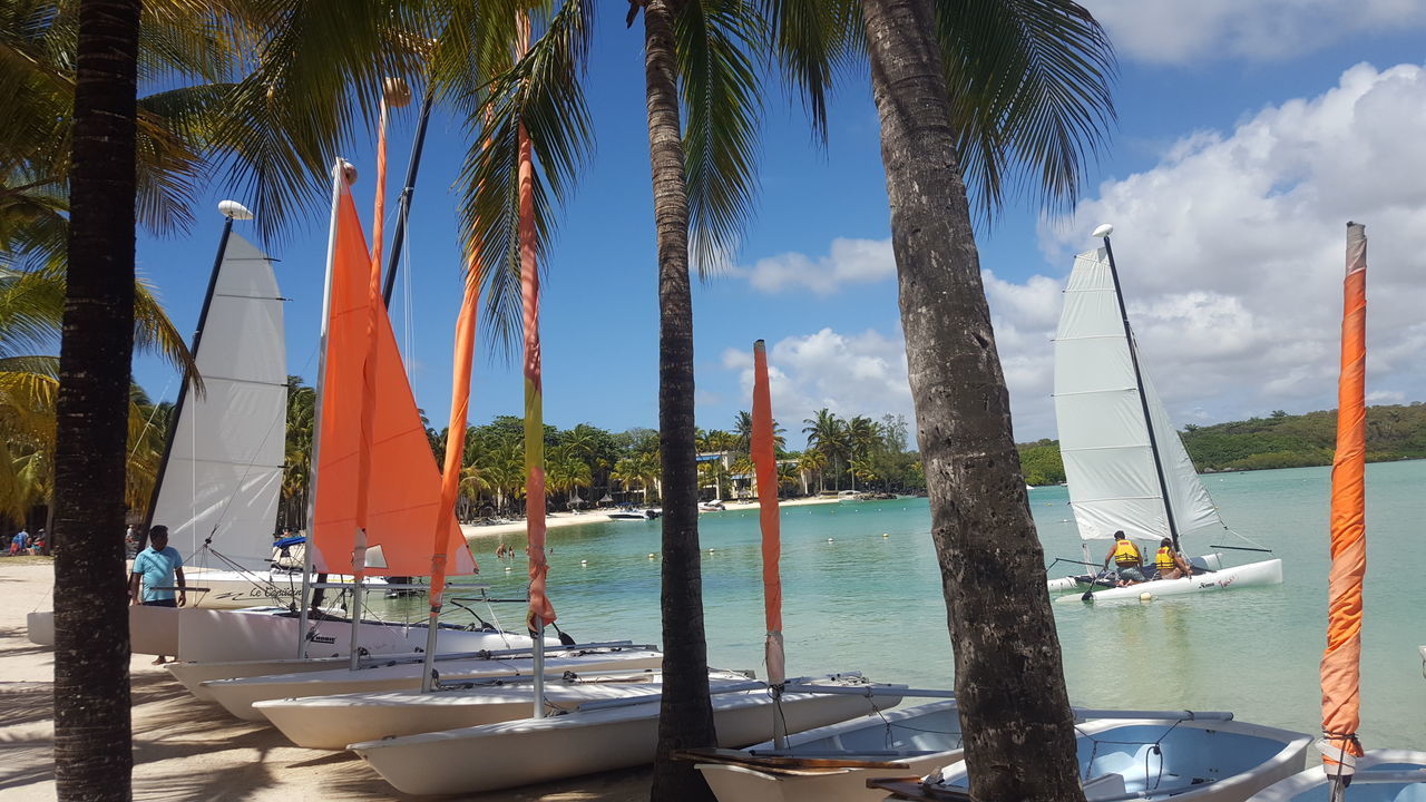 BOATS SAILING IN SEA