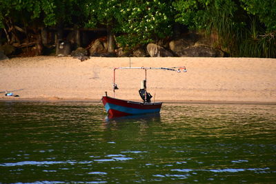 Boat moored in sea