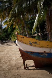 View of boat moored on beach