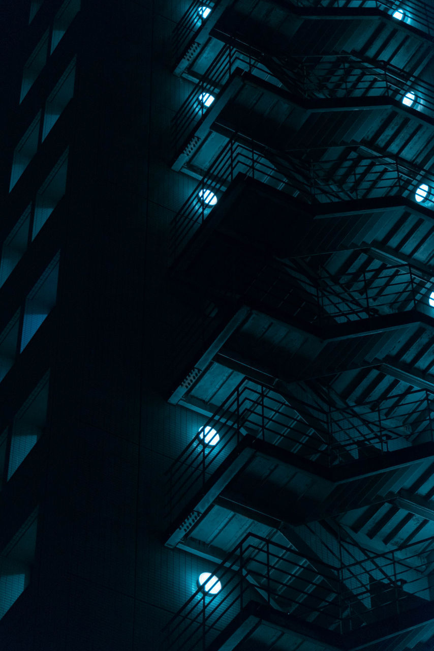 LOW ANGLE VIEW OF ILLUMINATED BUILDING