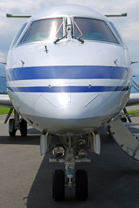 Close-up of airplane on airport runway