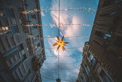 Low angle view of illuminated cityscape