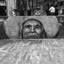 Close-up of statue against building