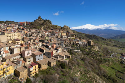 Village of cesaro the etna volcano in the background on the italian island of sicily