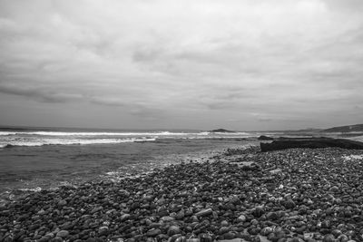 Scenic view of beach against sky