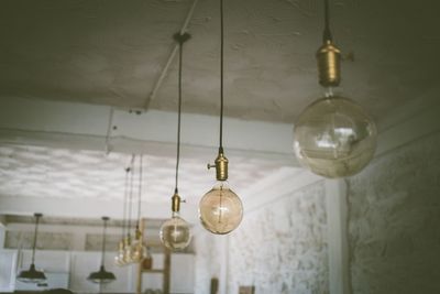 Low angle view of illuminated light bulb