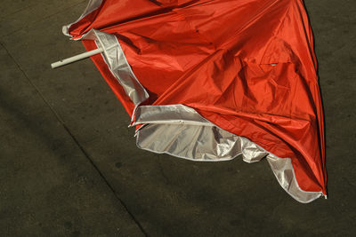 High angle view of red umbrella