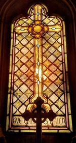 Low angle view of glass window in building