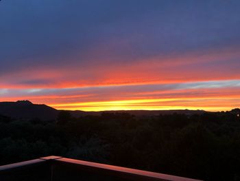 Scenic view of dramatic sky during sunset