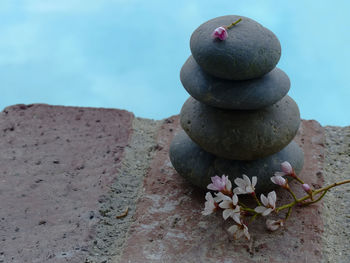 Close-up of stack of stones in water