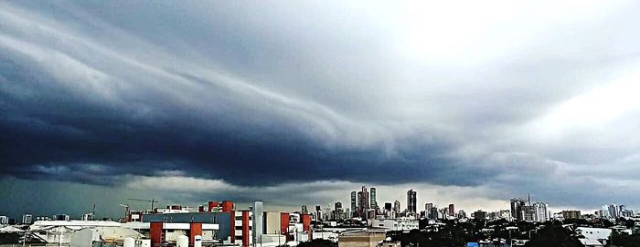 Panoramic view of cityscape against sky