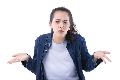 Portrait of a beautiful young woman over white background