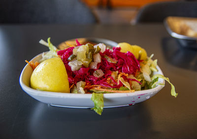 Close-up of fruits in bowl on table