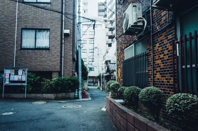 Street amidst residential buildings