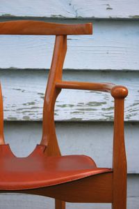 Close-up of chair on beach